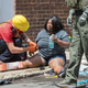 A woman received first aid after a car ran into a crowd of protesters in Charlottesville, Va., on Aug. 12, 2017. (Paul J. Richards/AFP/Getty Images)